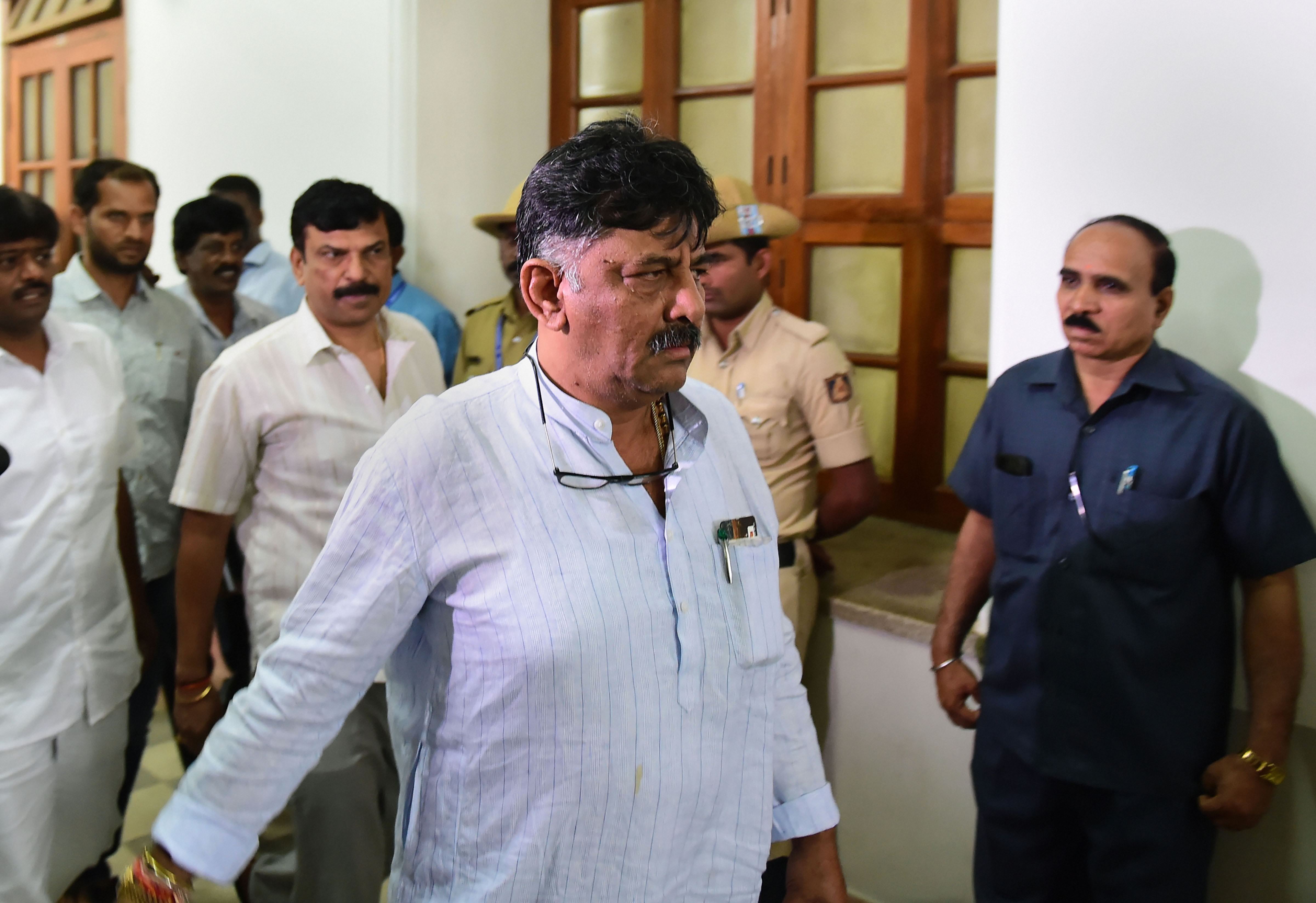 Karnataka minister and Congress leader D.K. Shivakumar arrives at Vidhana Soudha in Bengaluru on July 9. A day later, Shivakumar was outside the Mumbai hotel in a bid to meet the dissident MLAs of the Congress and the JDS, but they refused to meet him in the morning. 