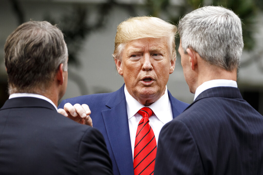 President Donald Trump pauses to talk as he leaves a ceremony with members of law enforcement on the South Lawn of the White House in Washington, Thursday, September 26, 2019.