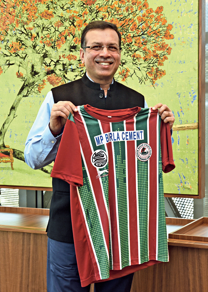 Sanjiv Goenka at RPSG House, with an ATK Mohun Bagan jersey