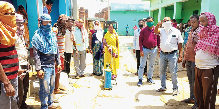 The health department team sanitises the village in Vishnugarh, Hazaribagh, on Sunday. 
