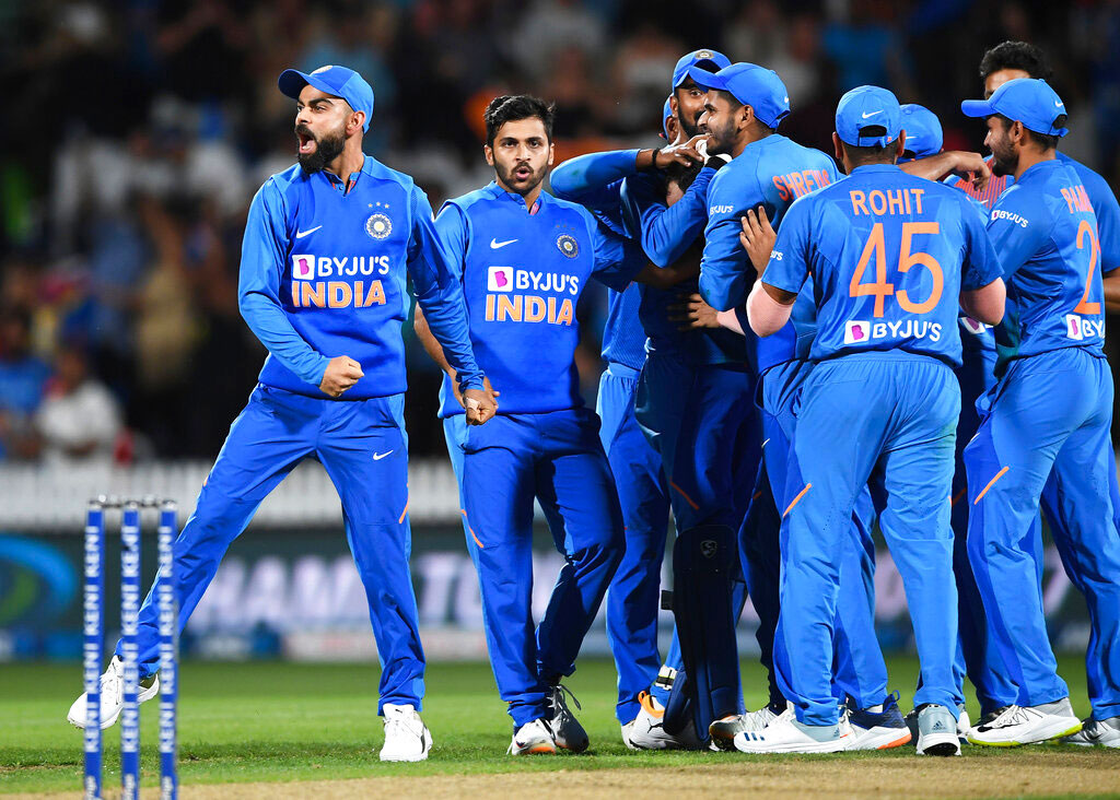 Virat Kohli celebrates as the game is tied and goes to a super over during the Twenty/20 cricket international between India and New Zealand in Hamilton on Wednesday