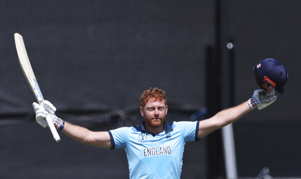England's Jonny Bairstow celebrates after scoring a century during the Cricket World Cup match between New Zealand and England in Chester-le-Street, England, Wednesday, July 3, 2019.