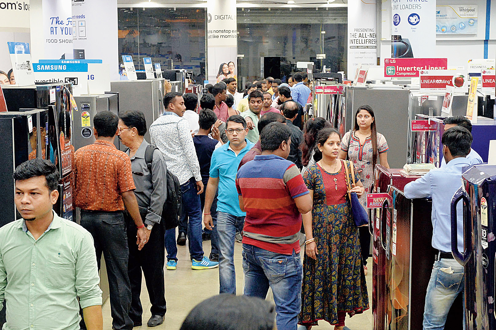 Shoppers throng Great Eastern Trading, a consumer durables store, at Dalhousie around 9.30pm.