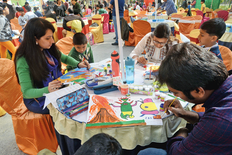 Calcutta International School students and their parents at the art workshop on Tuesday. 
