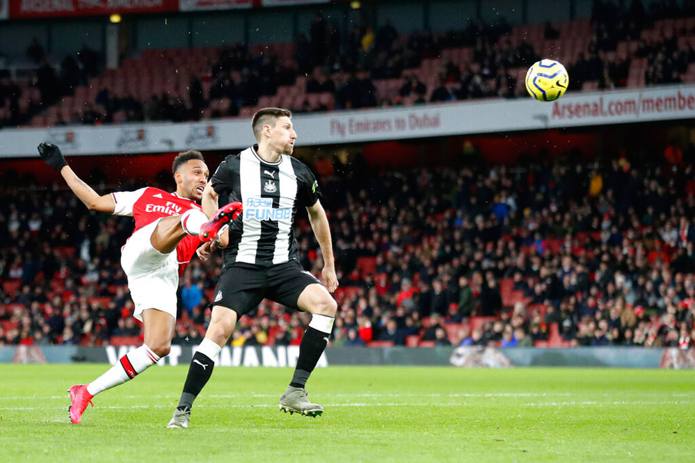 Pierre-Emerick Aubameyang takes a shot at goal during the English Premier League football match between Arsenal and Newcastle at the Emirates Stadium in London on Sunday