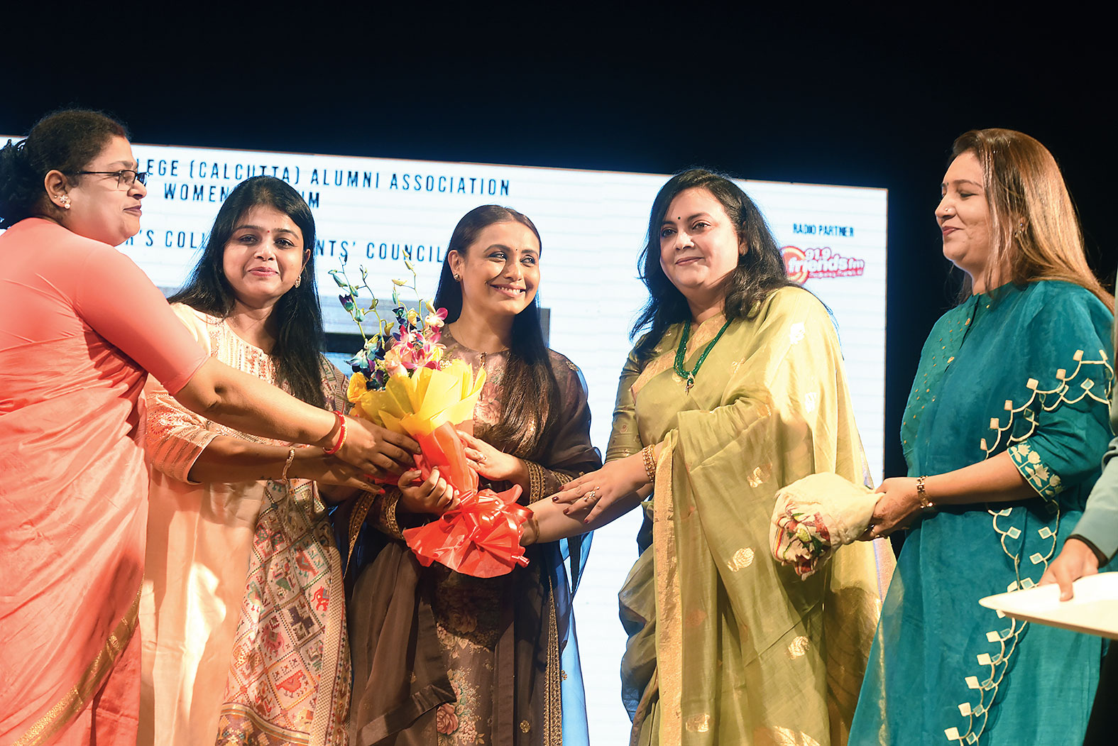 Members of the women’s cell of the college were all smiles as they walked on to stage to felicitate Rani.