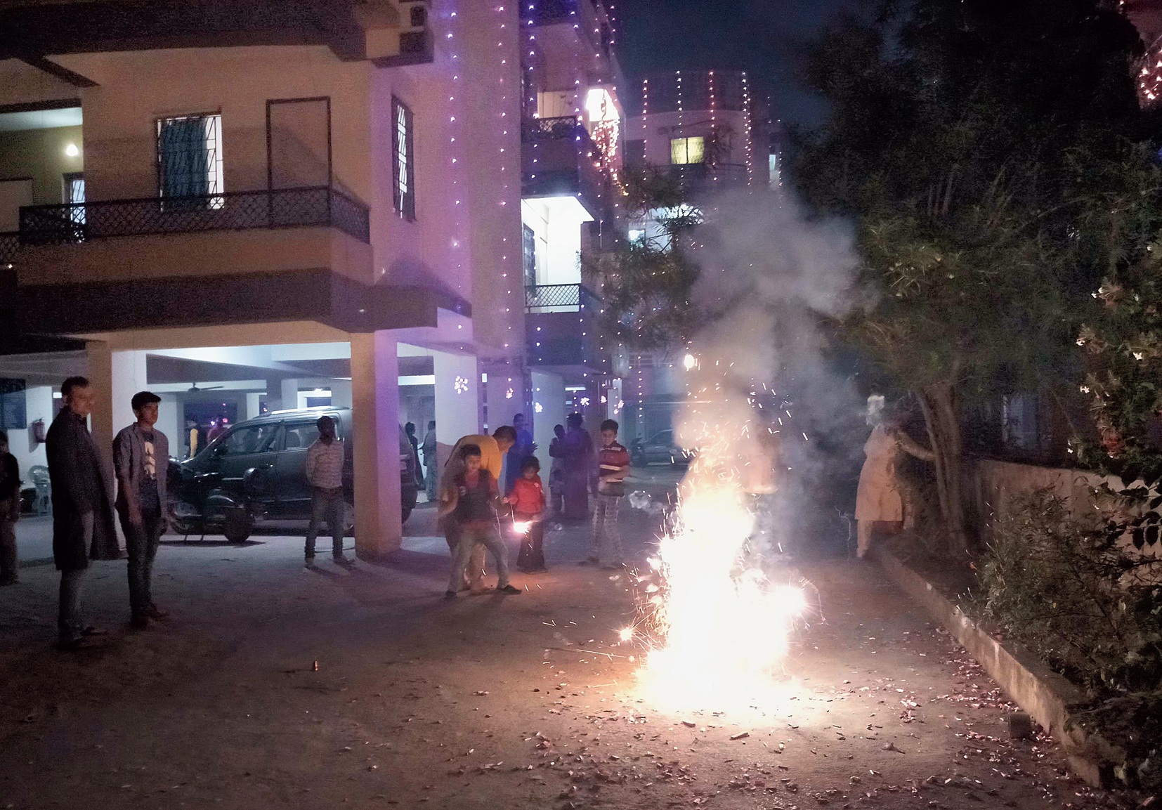 Children burst firecrackers at RP Singh Enclave in Kokar, Ranchi, on Diwali Wednesday. 