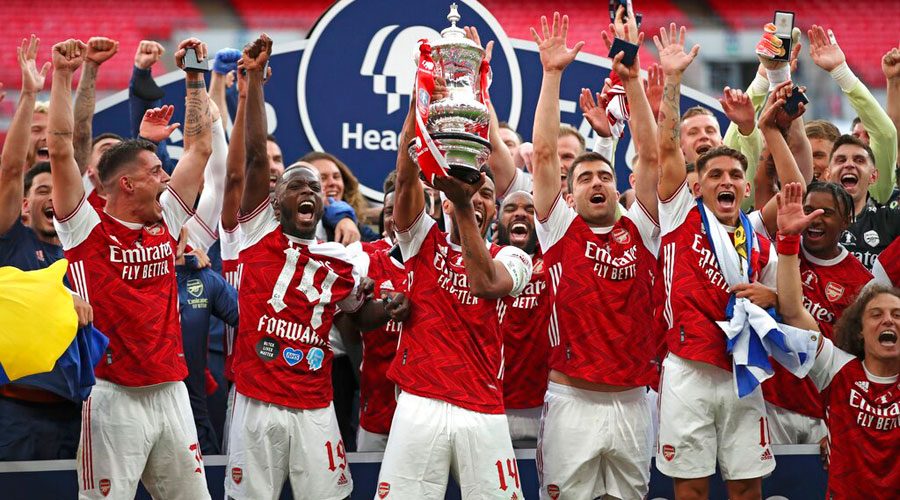 Arsenal FA Cup hero Pierre-Emerick Aubameyang DROPS trophy during  celebrations after scoring twice against Chelsea