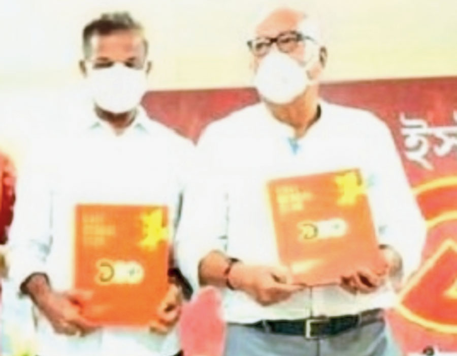 Manoranjan Bhattacharya and Subhas Bhowmick  unveil the centenary Almanac