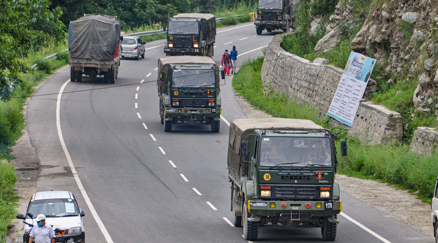 Indian Army trucks move towards Ladakh on the Manali-Leh highway on August 1