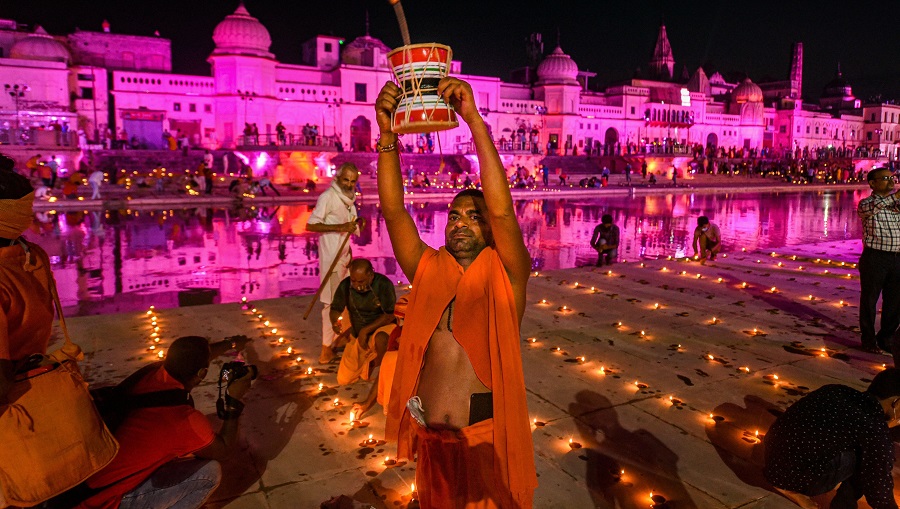 Hindu devotees celebrate Deepotsav at Ramghat on the eve of Bhoomi Pujan of the Ram Temple, in Ayodhya on Tuesday