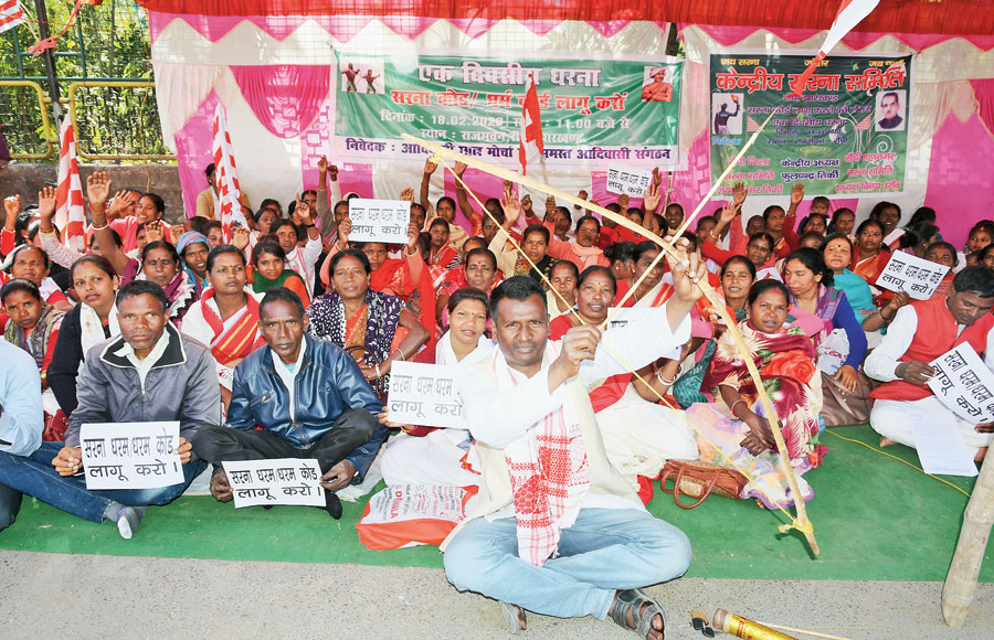 Members of the Adivasi Chatra Morcha and other tribal organisations on a sit-in to demand Sarna Code at Raj Bhavan in Ranchi on Tuesday. 