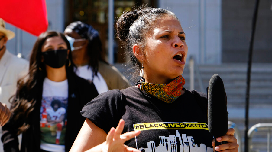 In this Aug. 5, 2020 file photo, Melina Abdullah speaks during a Black Lives Matter protest at the Hall of Justice in downtown Los Angeles. 