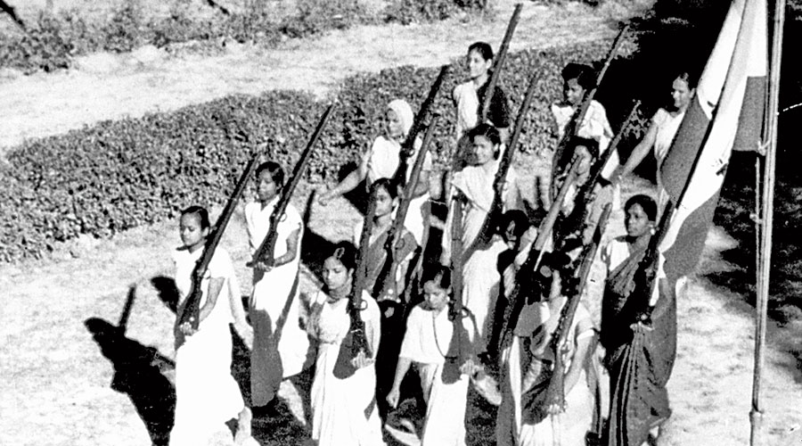 The women marching with rifles