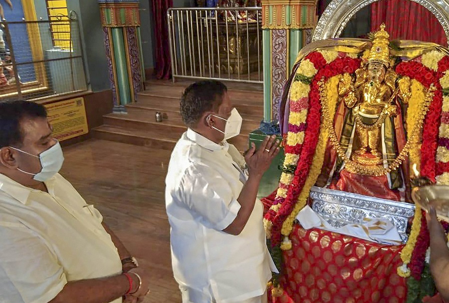 Puducherry Chief Minister V Narayanasamy offers prayers at a Ganesha temple on Saturday.