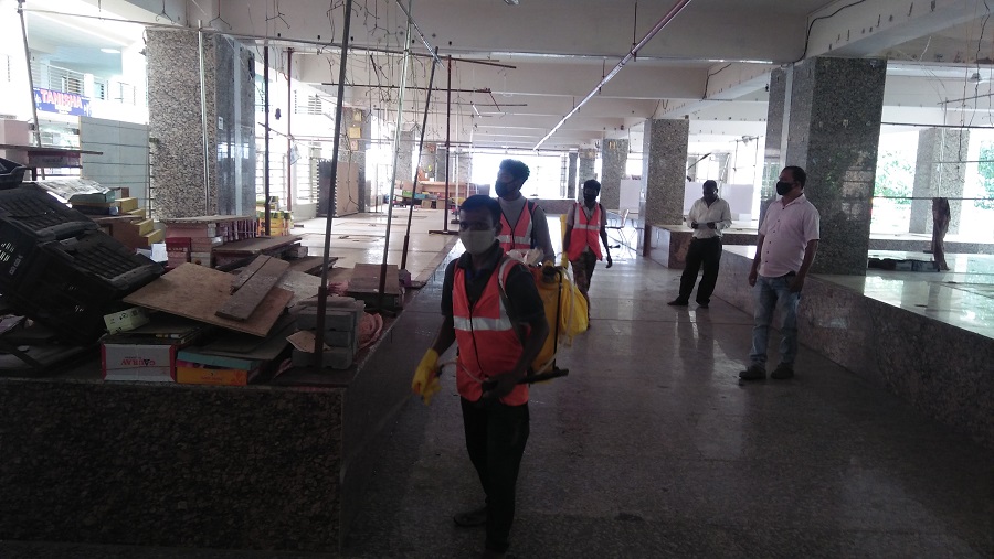 Ranchi Municipal Corporation workers sanitise the vendors’ market on Tuesday ahead of its reopening.