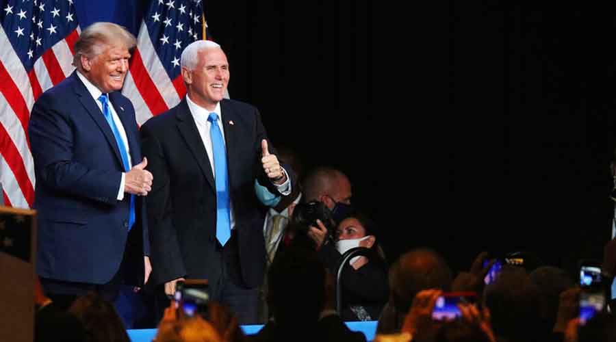 President Donald Trump and Vice President Mike Pence give a thumbs up after speaking during the first day of the Republican National Convention Monday, August 24, 2020,