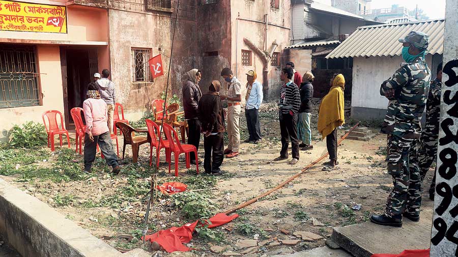 Workers at the ransacked CPM office with flags strewn on the ground, also in Arambagh on Thursday