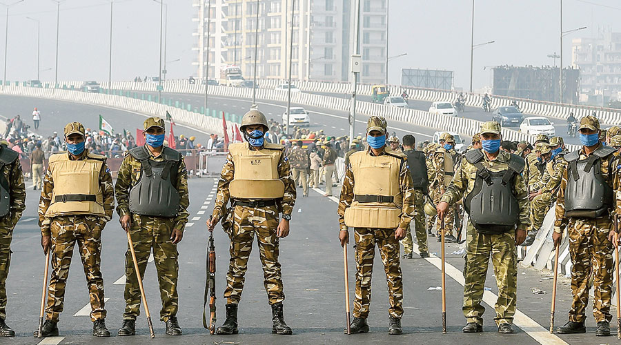 Policemen block the Delhi-Meerut Expressway on Friday.