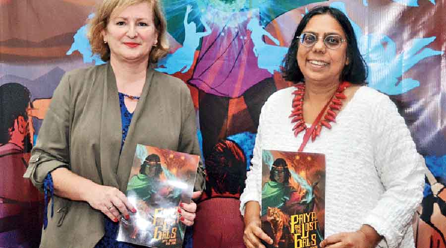French consul general Virginie Cotreval and Ruchira Gupta with the comic
