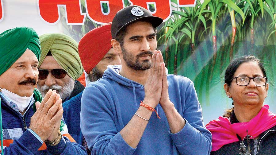 Boxer Vijender Singh at the  Singhu border to show his support  for the agitating farmers.  