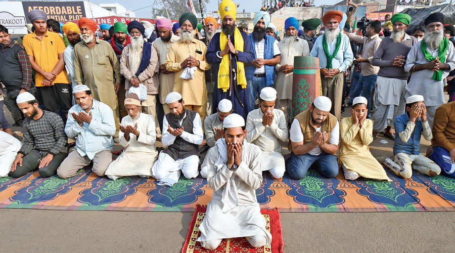 Prayers during the agitation against the new farm laws at the Singhu border near New Delhi  on Monday.