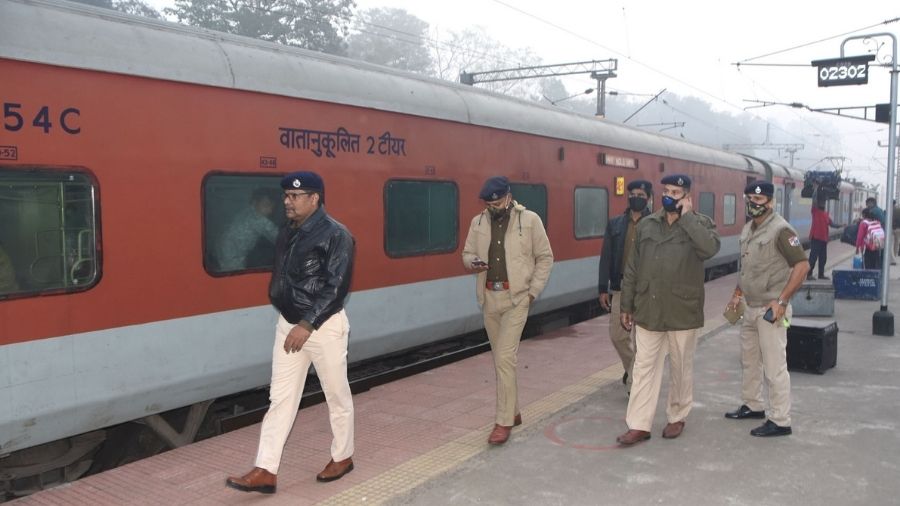RPF jawans keep vigil on the New Delhi-Howrah AC Special (Rajdhani Express) at Dhanbad railway Station on Tuesday.
