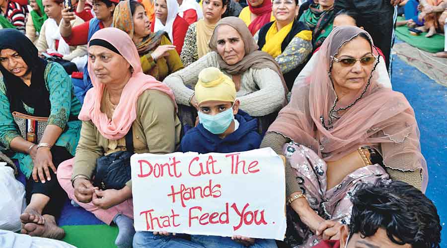 A child holds up a poster at the protest