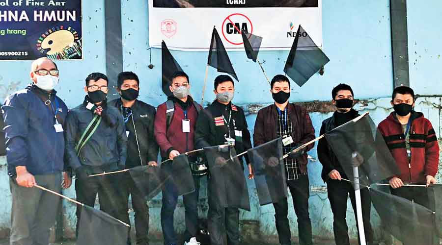 Mizo Zirlai Pawl members participating in the Neso black day programme in Mizoram on Friday
