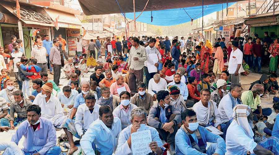 Villagers block the state highway near Kalyani on Monday