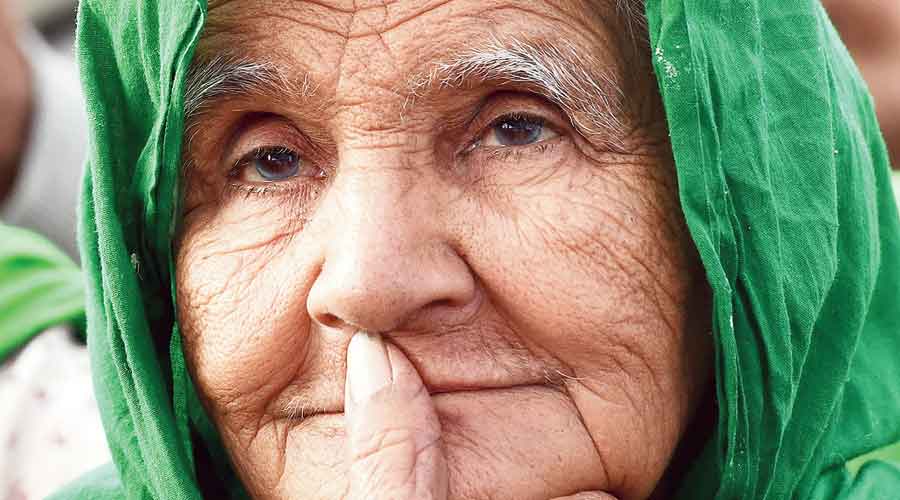 An elderly woman at the farmers’ protest at the Tikri border near New Delhi on Tuesday