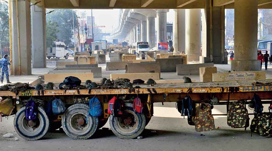 Police barricades at the Tikri border to keep the farmers out of Delhi