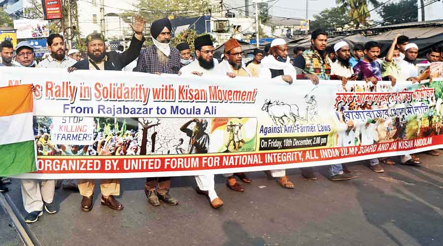 Around 500 people from various walks of life march in a rally from Rajabazar to Moulali on Friday afternoon to protest the three farm laws enacted by the Centre.
