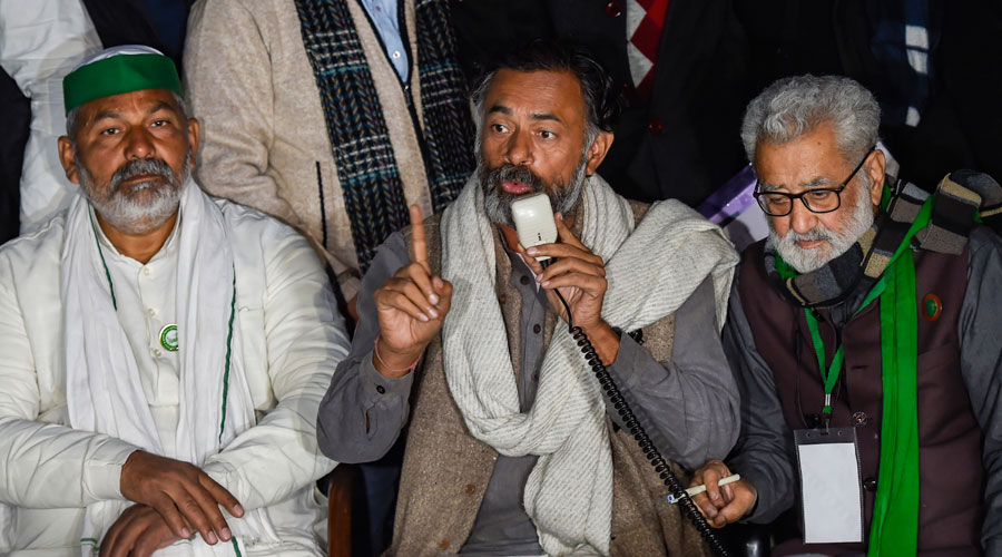 BKU spokesperson Rakesh Tikiat, political activist Yogendra Yadav and others address media at Singhu border during farmers sit-in protest against the Centres farm reform laws, in New Delhi on Sunday, Dec. 20, 2020.