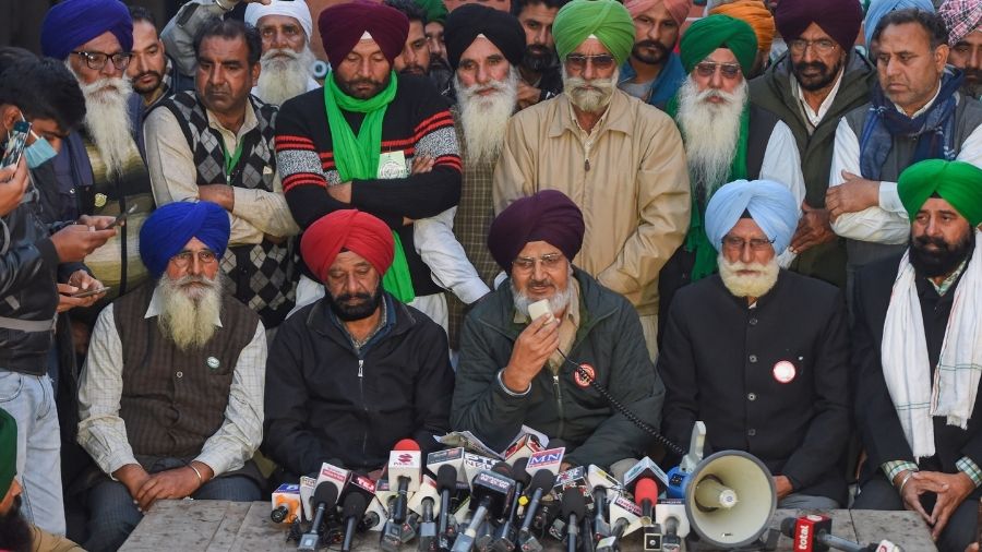 Farmer union leaders hold press conference at the Singhu border near Delhi on Tuesday.