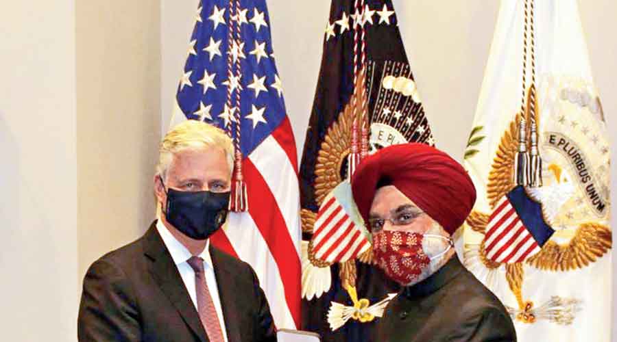 India’s ambassador to the US, Taranjit Singh Sandhu, accepts the ‘Legion of Merit’ award on behalf of the Prime Minister from the US National Security Advisor Robert O’Brien at the White House on Tuesday