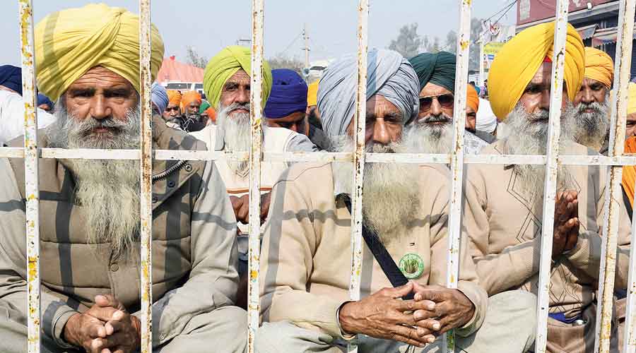 The protesting farmers at the Singhu border between Delhi and Haryana on Wednesday