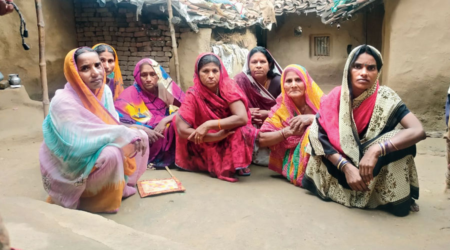 Relatives and villagers grieve for Sikandar Yadav in Bihar’s Rohtas district on Tuesday. 