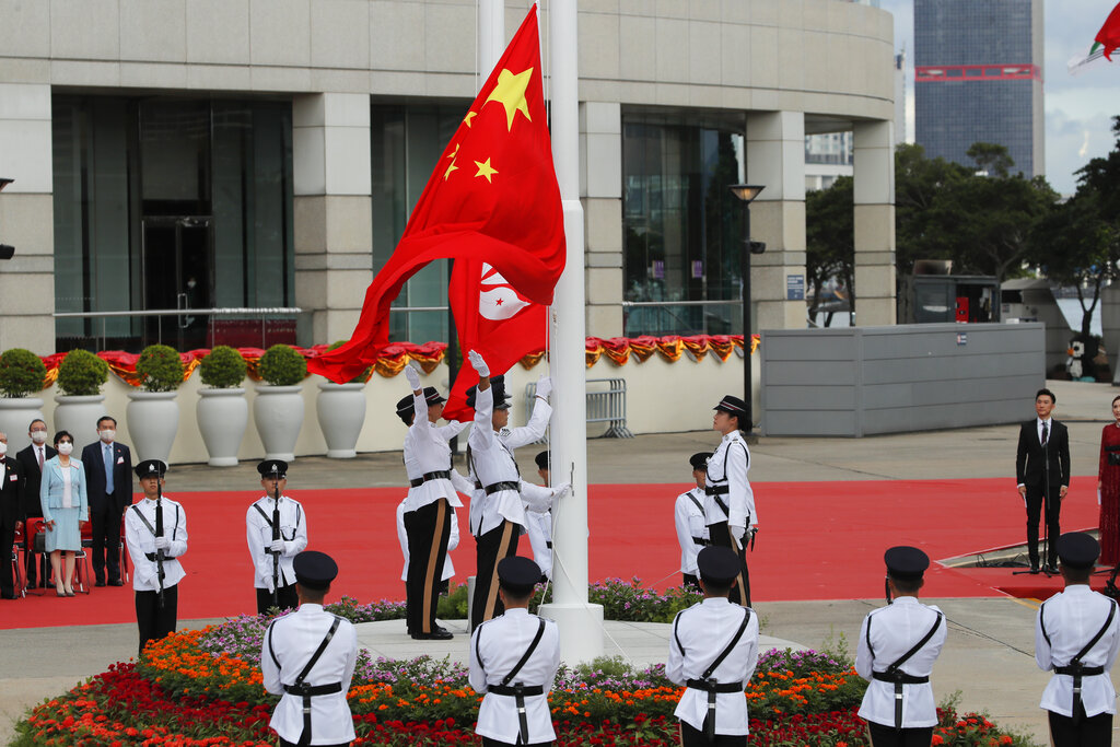 A flag raising ceremony is held at the Golden Bauhinia Square to mark the anniversary of the Hong Kong handover to China in Hong Kong, Wednesday, July 1, 2020. 
