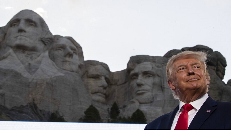 President Donald Trump smiles at Mount Rushmore National Memorial, Friday, July 3, 2020, near Keystone, South Dakota