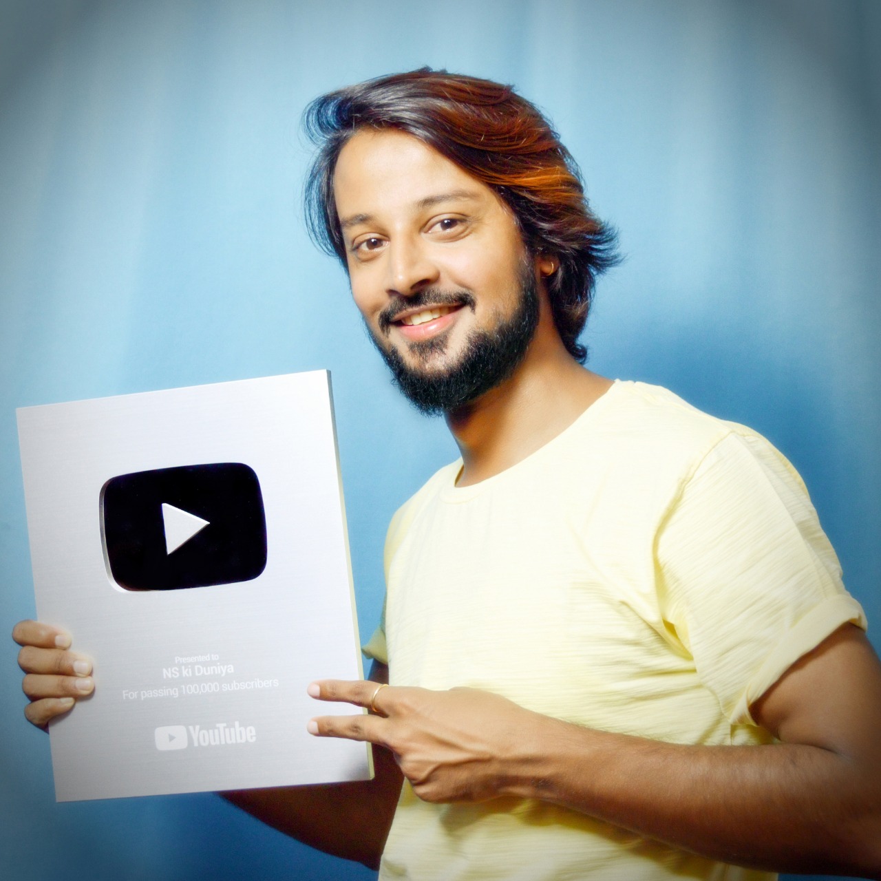 Nishant Soni with YouTube’s silver disc
