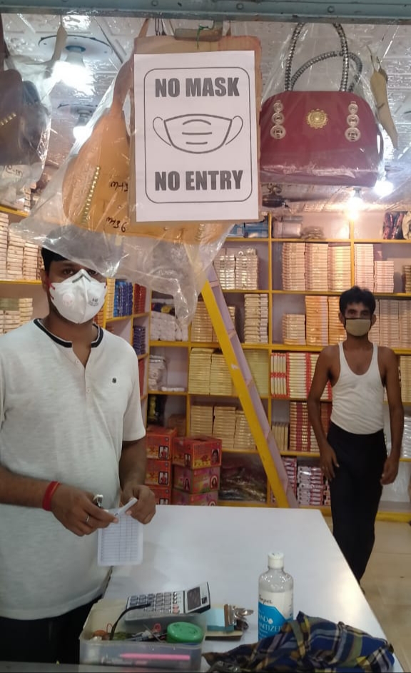 The notice "No Musk No Entry "being displayed at the shops in Rangatand,Dhanbad today.