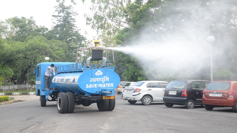 A tanker sprays disinfectants in Bokaro town areas on Sunday
