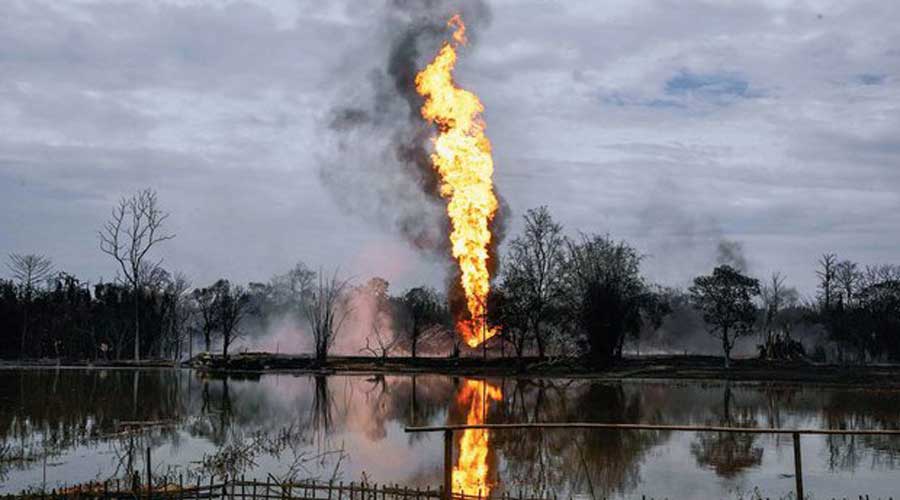 Smoke billows from the oil well fire at Baghjan in Tinsukia district of Assam.