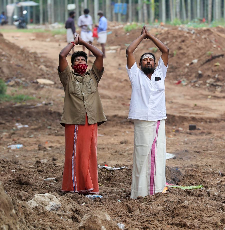 Priests offer prayers for salvation of their ancestors on the occasion of ‘Aadi Amavasya in Coimbatore, Monday