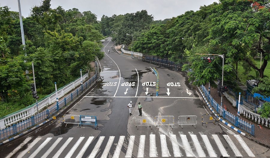 A city road wears a deserted look during the weekly two-day complete lockdown to curb the spread of coronavirus disease, in Calcutta, Thursday, July 23, 2020
