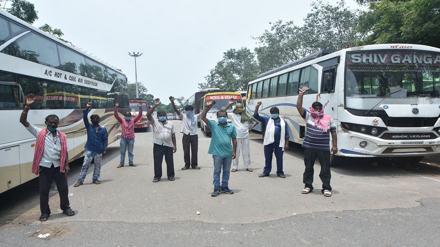 Bus owners, drivers and conductors hold a demonstration at the Bartand bus stad in Dhanbad on Thursday