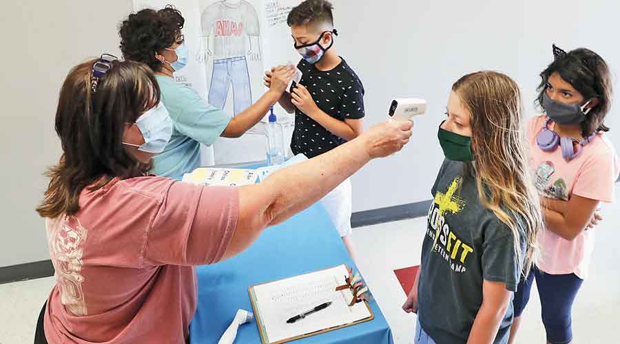 Study: Kids carry virus at high levels -Children younger than age 5 may host up to 100 times as much of the infection in the upper respiratory tract as adults