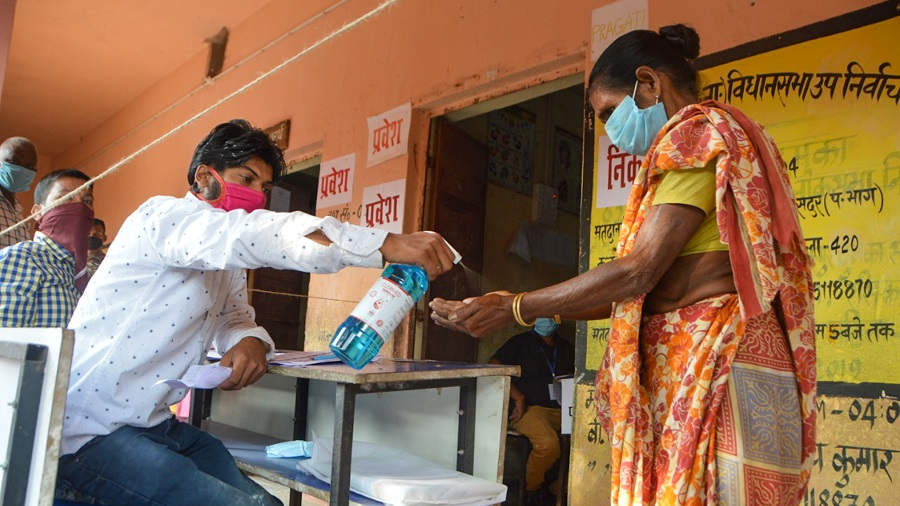 Covid guidelines were followed and voters sanitized before entering polling booths.