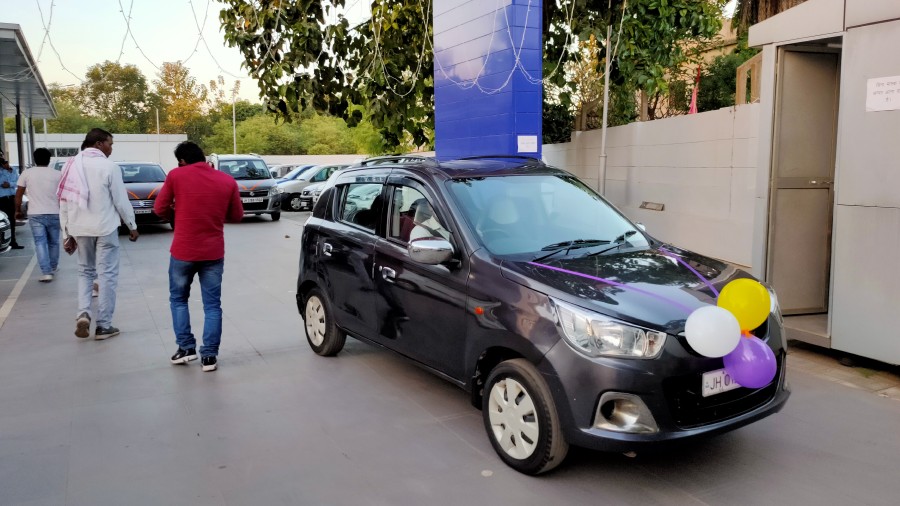 Customers buy second-hand cars ahead of Dhanteras in Ranchi on Thursday. 